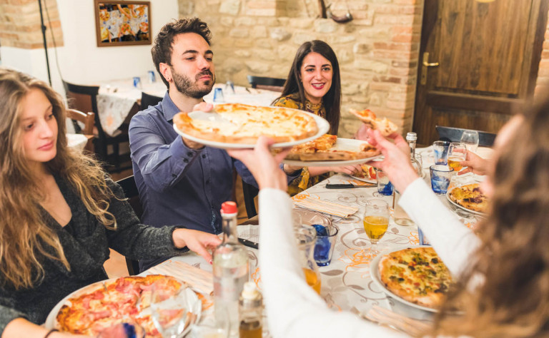group sharing pizza